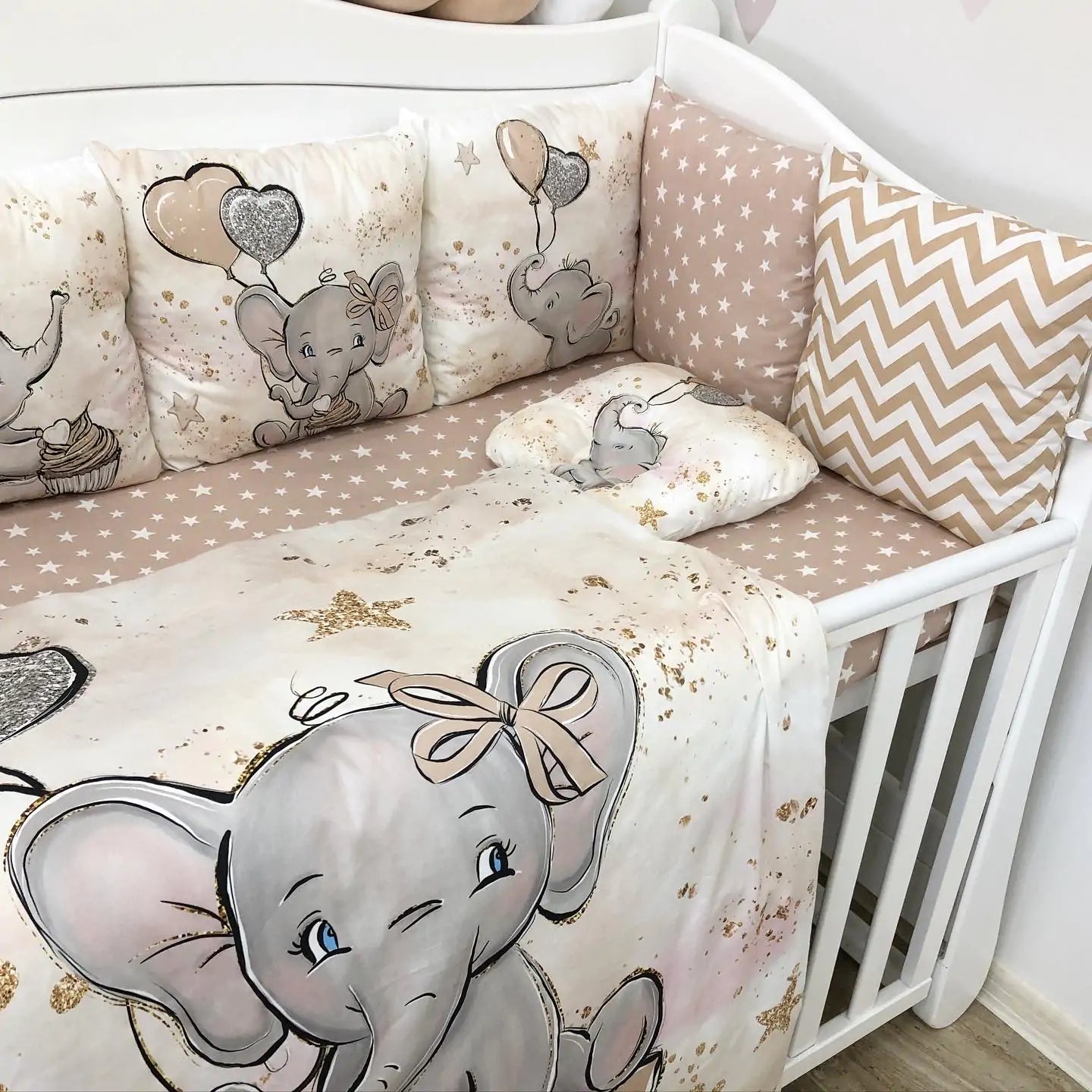 Beige elephant crib set with baby nest