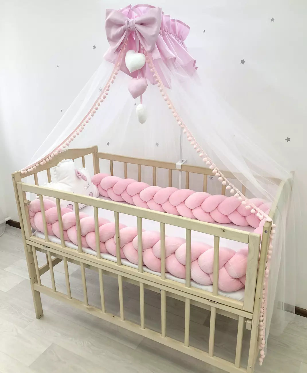 Snuggle crib bedding in pink white color for newborns girls