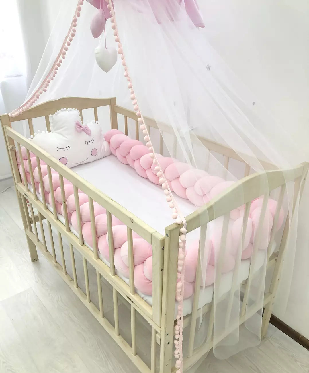 Snuggle crib bedding in pink white color for newborns girls