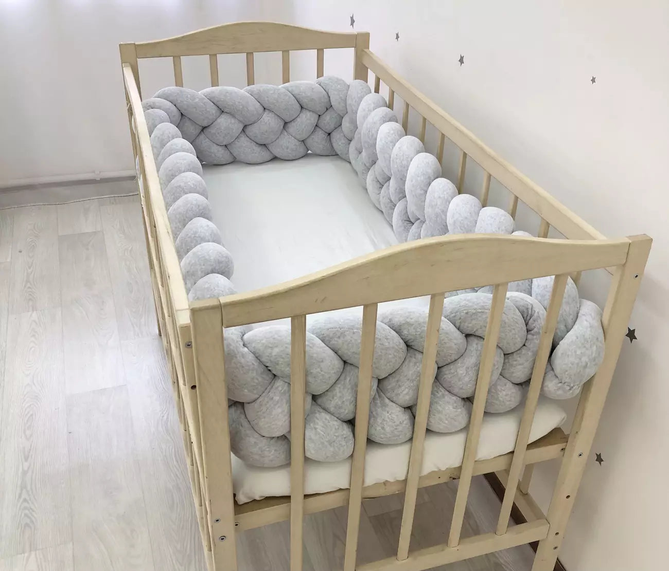 Gray braided crib bumper