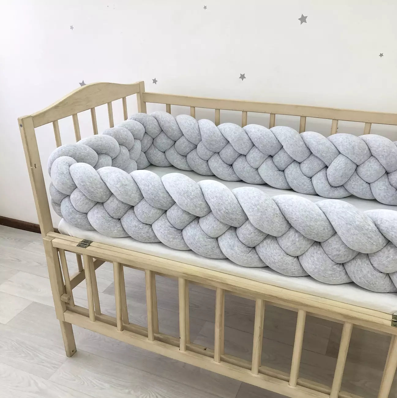 Gray braided crib bumper