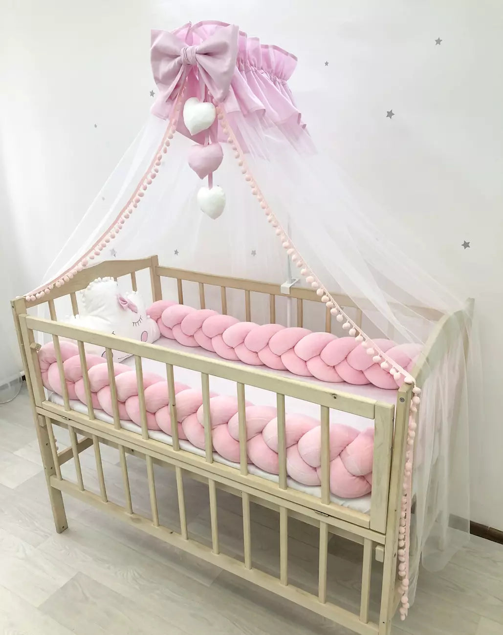 Snuggle crib bedding in pink white color for newborns girls