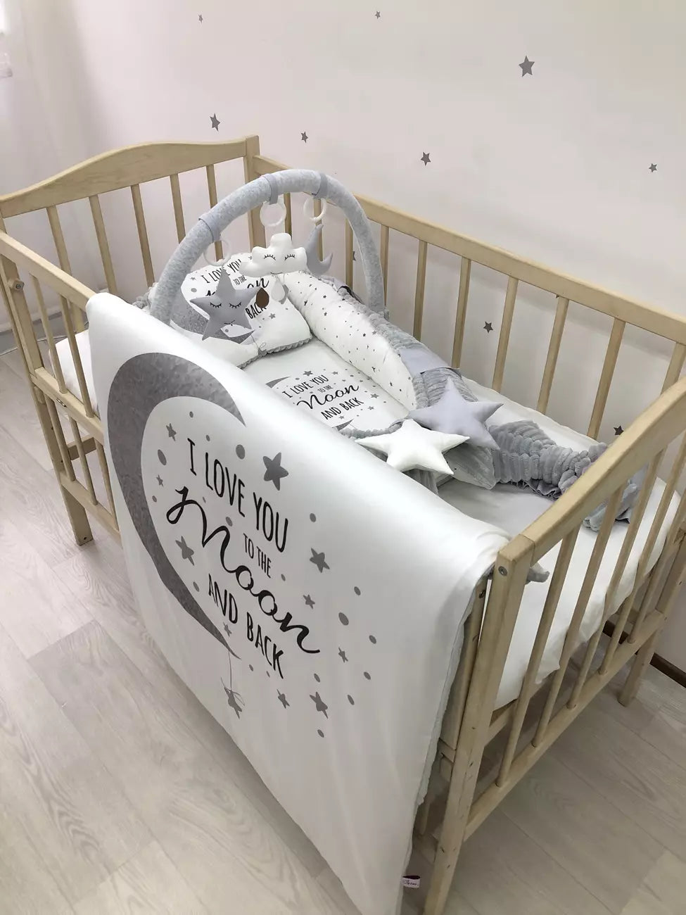 Gray baby nest lounger with the baby blanket