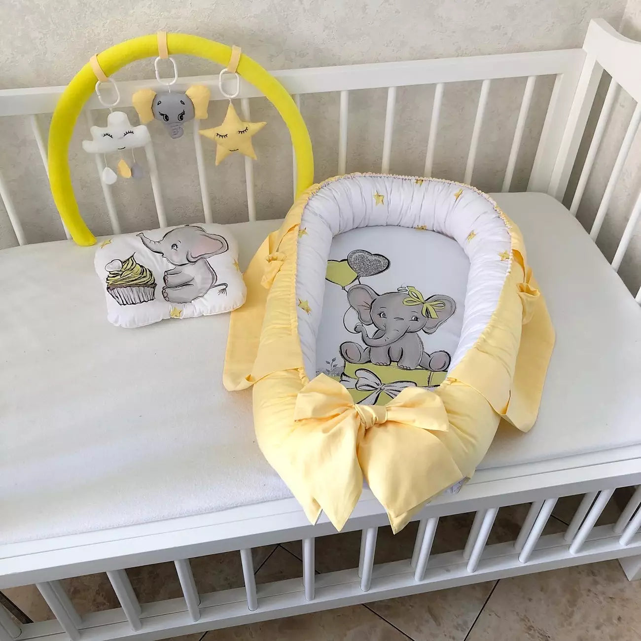 Baby Nest yellow Elephant “Nest for babies with bow and toys”