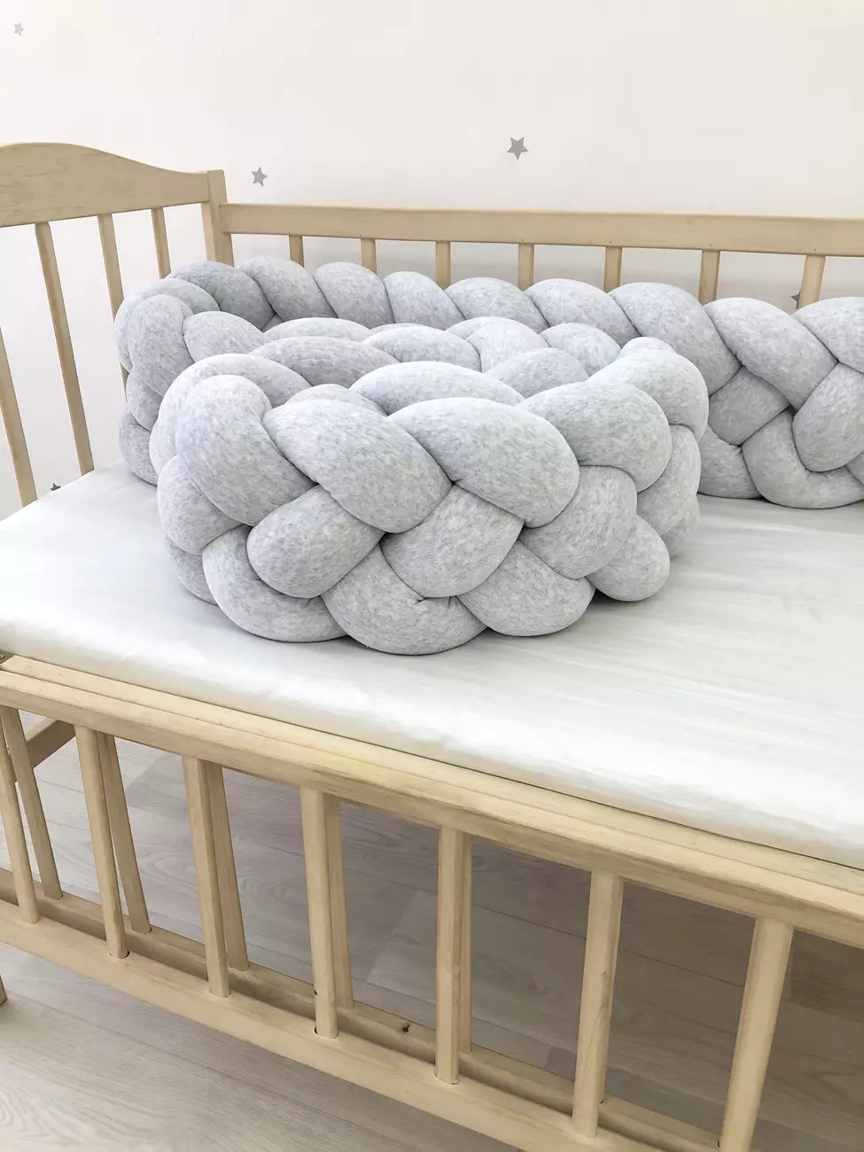 Gray braided crib bumper